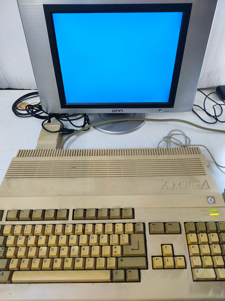 Pair of Commodore Amiga A500 Consoles with various accessories - Repair